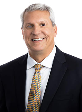A photograph of Mark Henderson, Executive Vice President of PCI Technology, LLC